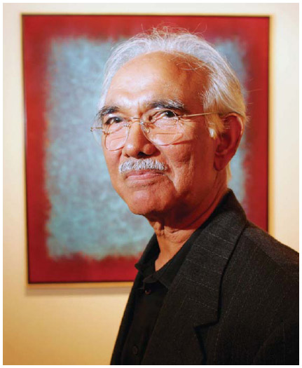 New York artist and Indian expatriate Natvar Bhavsar (1934–) stands in front of one of his works at the Mira Godard Gallery in Toronto, 2005.